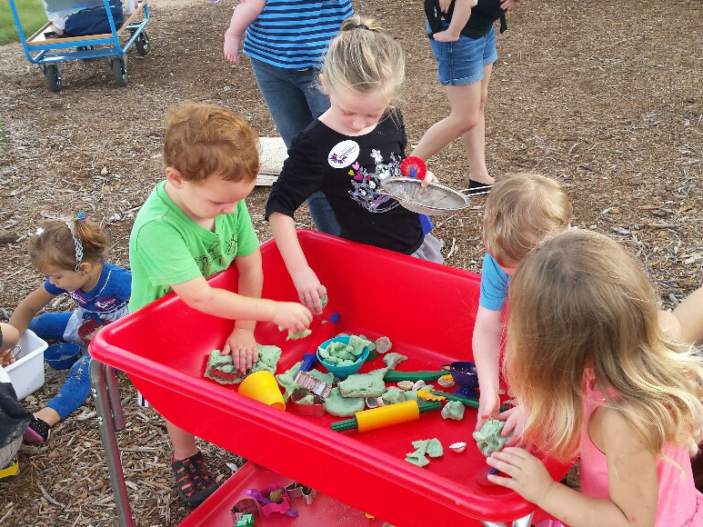 Children playing at Discovery Bin